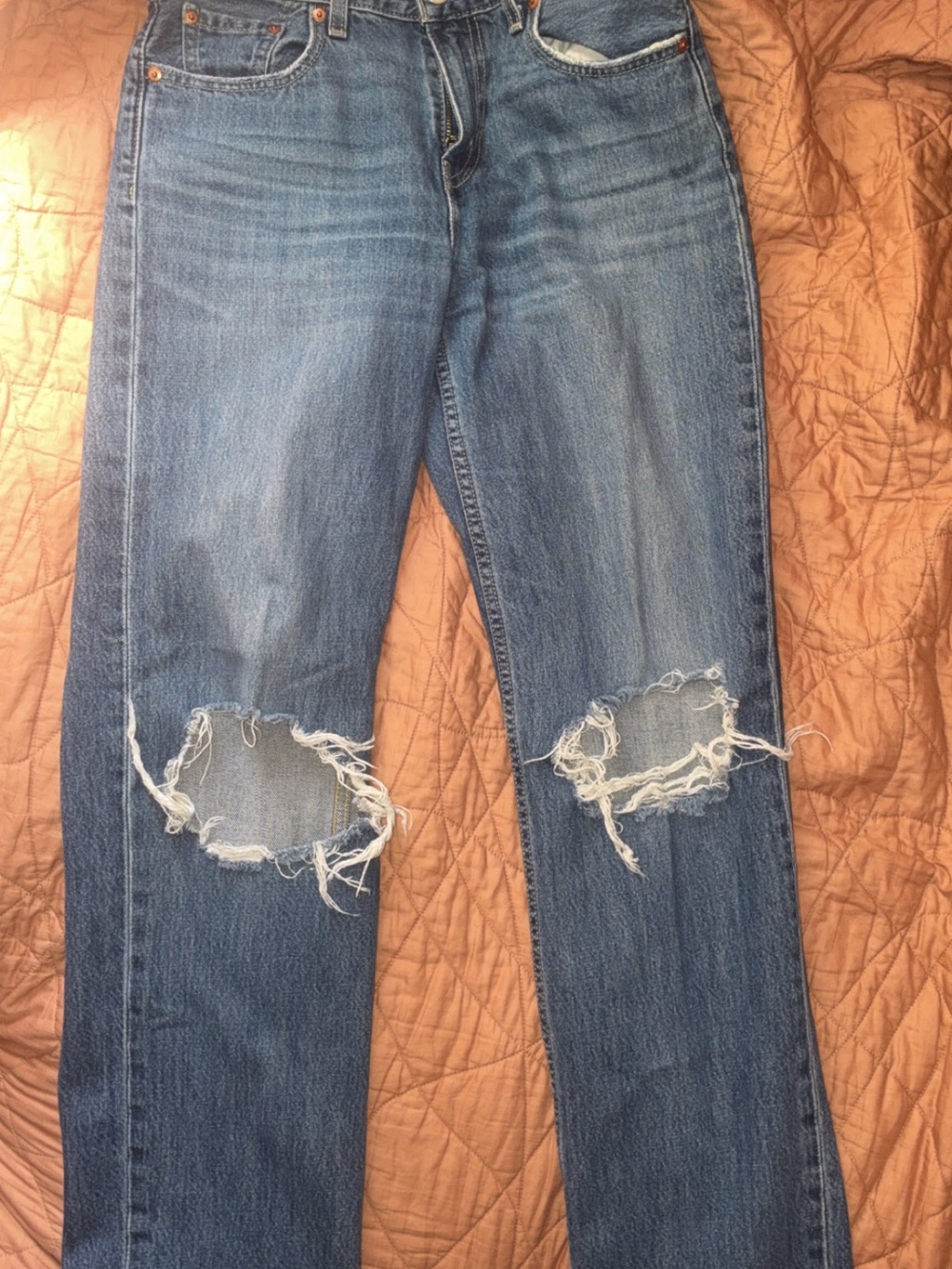 Distressed Blue Straight-Leg Jeans with Knee Rips
